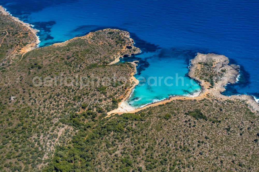 Aerial photograph S'Estany d'en Mas - Water surface at the bay along the sea coast of Bucht Cala Varques in Manacor in Balearic island of Mallorca, Spain