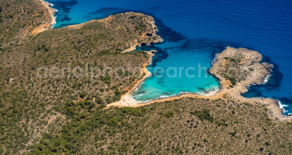 S'Estany d'en Mas from above - Water surface at the bay along the sea coast of Bucht Cala Varques in Manacor in Balearic island of Mallorca, Spain