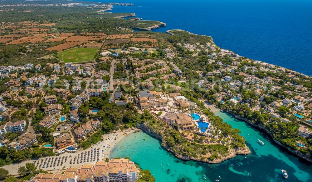 Aerial image Cala Ferrera - Water surface at the bay along the sea coast in Cala Ferrera in Balearic island of Mallorca, Spain