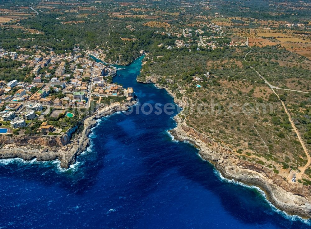 Cala Figuera from the bird's eye view: Water surface at the bay along the sea coast in Cala Figuera in Balearic island of Mallorca, Spain