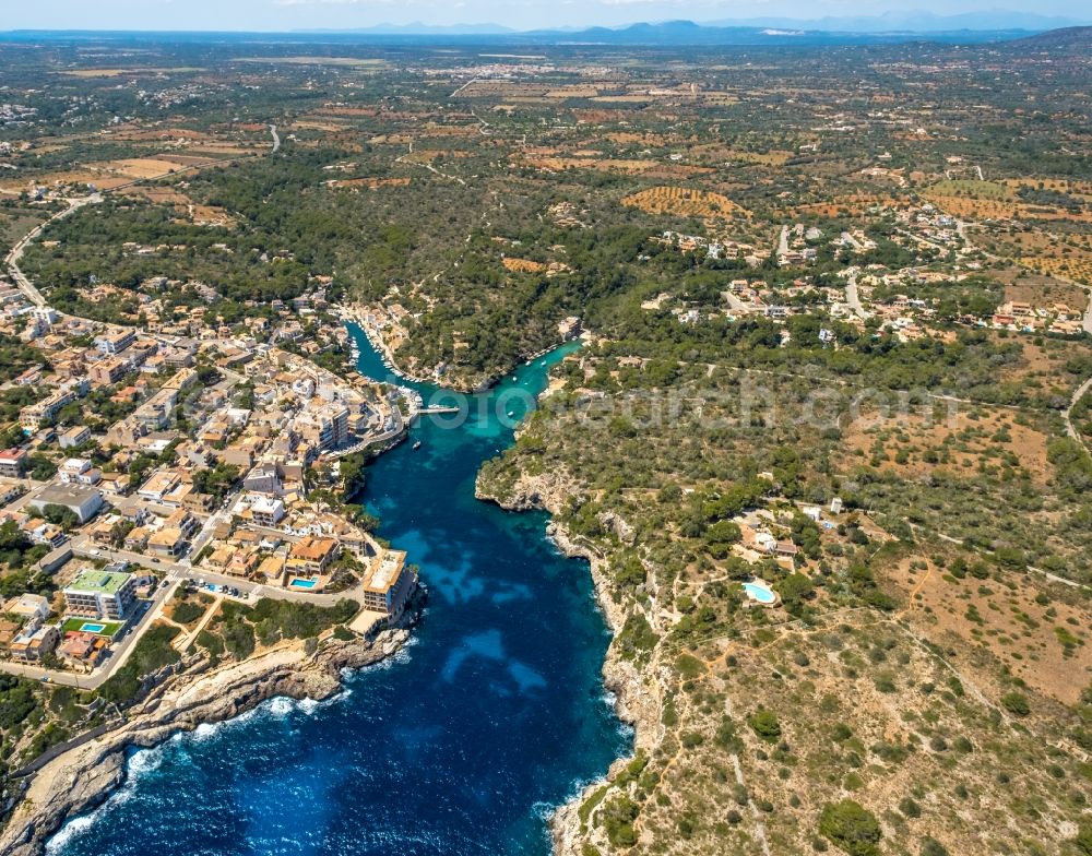 Aerial image Cala Figuera - Water surface at the bay along the sea coast in Cala Figuera in Balearic island of Mallorca, Spain