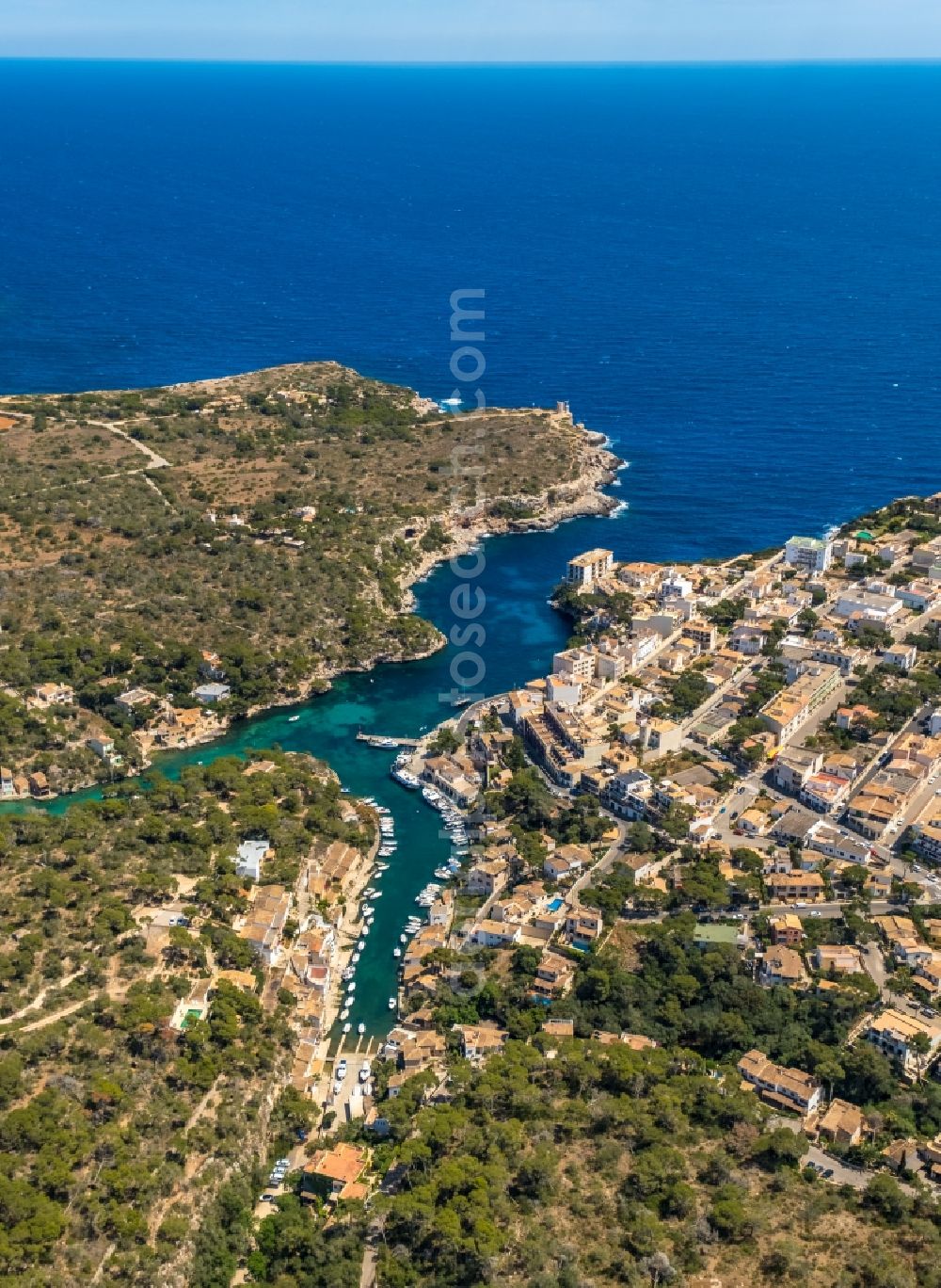 Aerial photograph Cala Figuera - Water surface at the bay along the sea coast in Cala Figuera in Balearic island of Mallorca, Spain