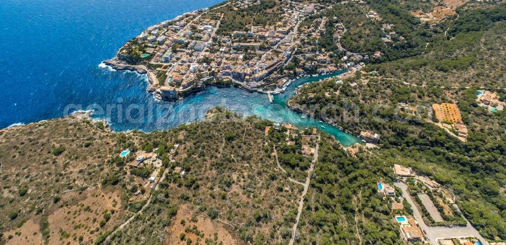 Aerial image Cala Figuera - Water surface at the bay along the sea coast in Cala Figuera in Balearic island of Mallorca, Spain