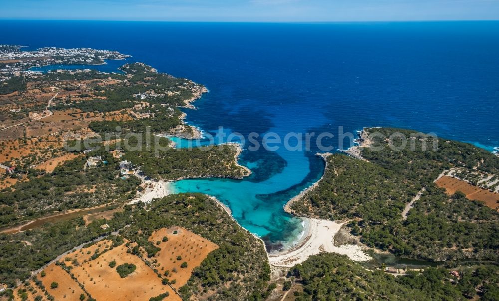 Aerial photograph Santanyi - Water surface at the bay along the sea coast Cala MondragA? with beaches in Santanyi in Balearic island of Mallorca, Spain