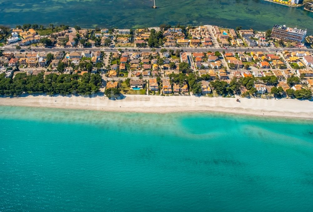 Aerial image Alcudia - Water surface at the bay along the sea coast along the Carretera d'Arta in Alcudia in Balearic island of Mallorca, Spain