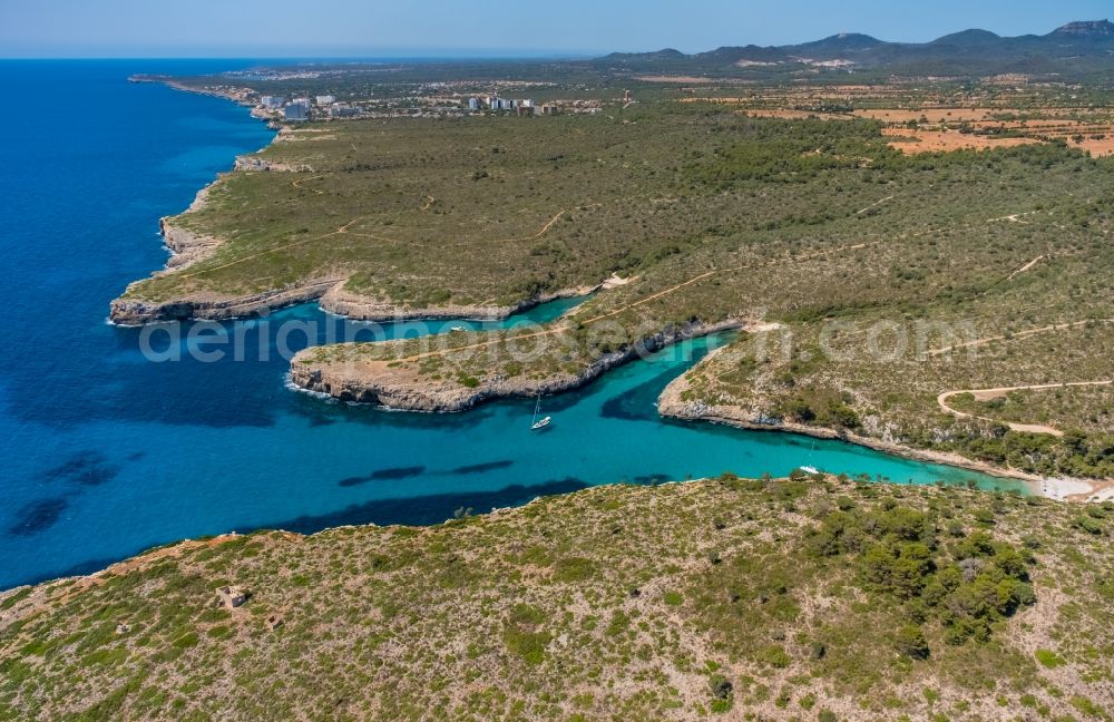 Aerial photograph Manacor - Water surface at the bay along the sea coast Illes Balears in Manacor in Balearic island of Mallorca, Spain