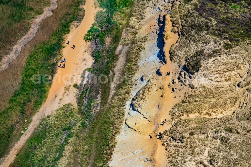 Aerial image Morsum - Water surface at the bay along the sea coast Morsumer Kliff in Morsum on Island Sylt in the state Schleswig-Holstein, Germany