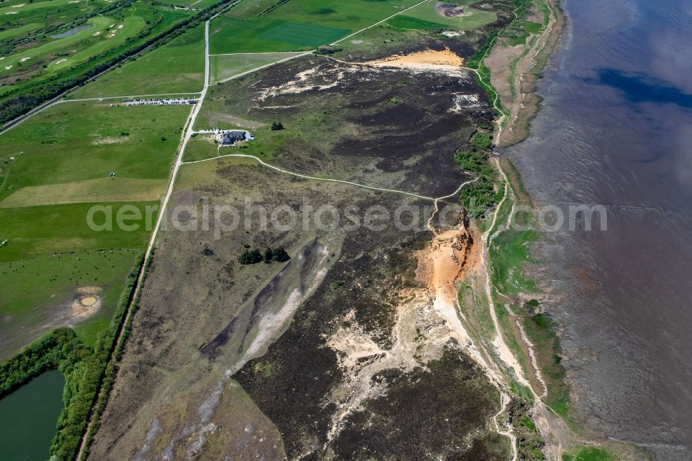 Aerial photograph Morsum - Water surface at the bay along the sea coast Morsumer Kliff in Morsum on Island Sylt in the state Schleswig-Holstein, Germany