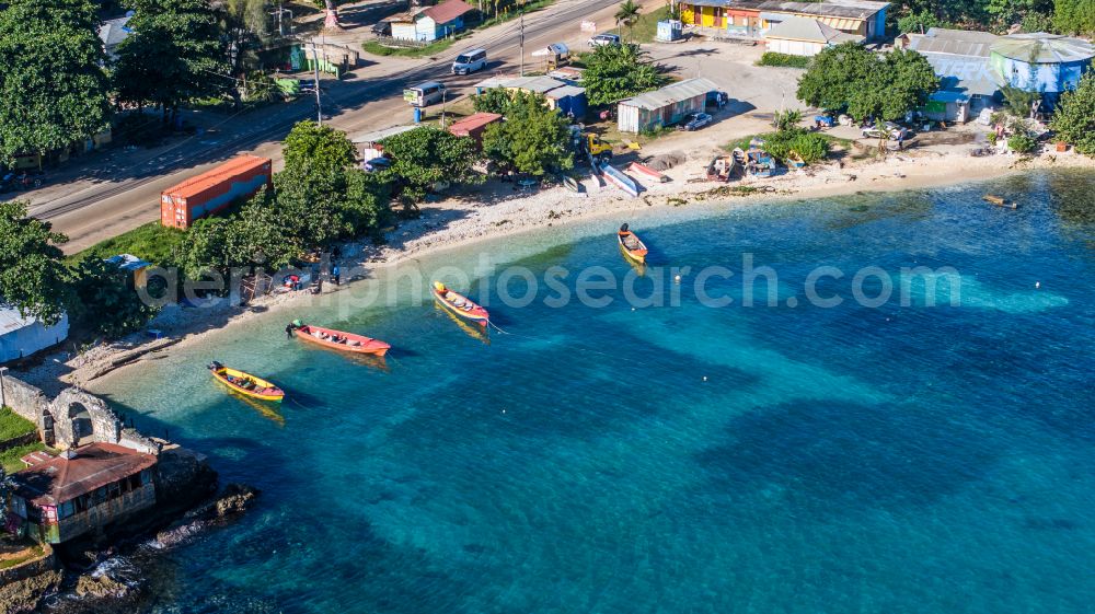 Aerial image Discovery Bay - Water surface at the bay along the sea coast Old Folly on street A1 in the district Old Folly in Discovery Bay in St. Ann Parish, Jamaica