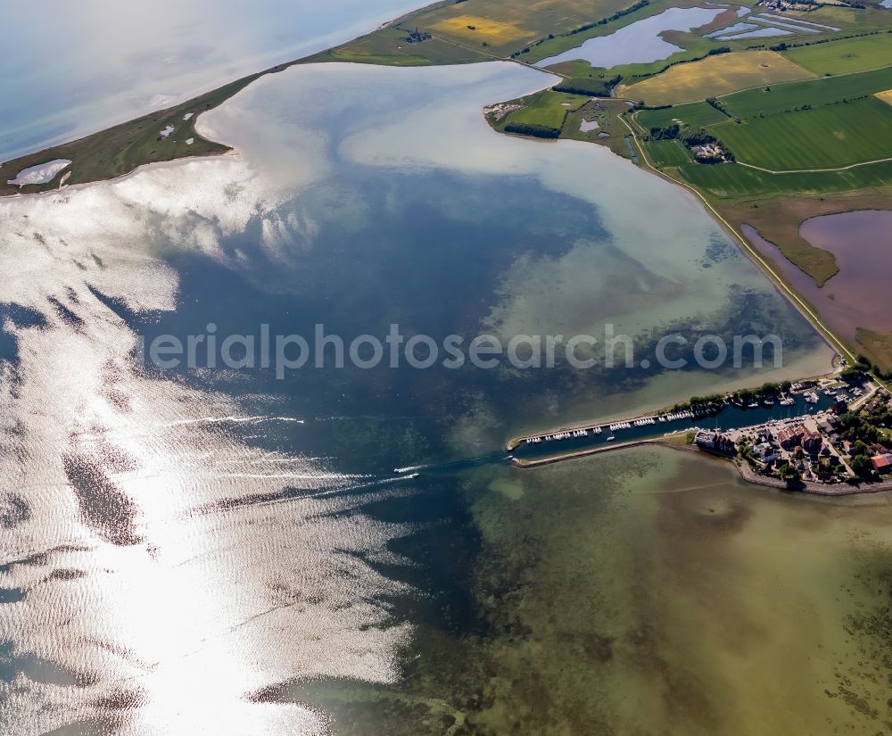 Aerial image Fehmarn - Water surface at Orth Bay along the sea coast in Orth in Fehmarn on the island of Fehmarn in the state Schleswig-Holstein, Germany