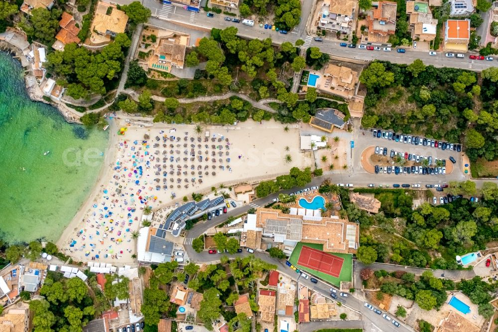 Cala Santanyi from the bird's eye view: Water surface at the bay along the sea coast Playa de SantanyA? in Cala Santanyi in Balearische Insel Mallorca, Spain