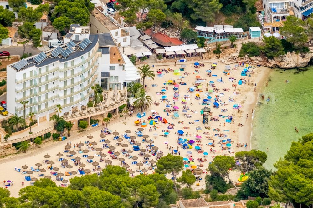 Aerial image Cala Santanyi - Water surface at the bay along the sea coast Playa de SantanyA? in Cala Santanyi in Balearische Insel Mallorca, Spain