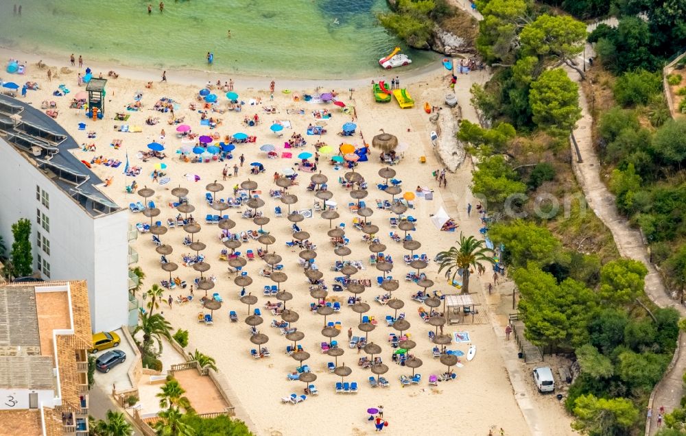 Aerial photograph Cala Santanyi - Water surface at the bay along the sea coast Playa de SantanyA? in Cala Santanyi in Balearische Insel Mallorca, Spain