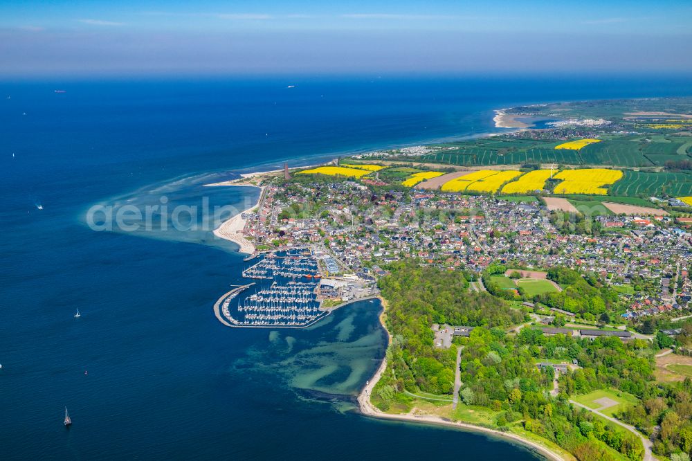 Aerial image Laboe - Bay along the sea coast with marina and commercial port on the Kieler Foerde in Laboe in the state Schleswig-Holstein, Germany. The Laboe Baltic Bay Hafen combines maritime trade in the south-western port area