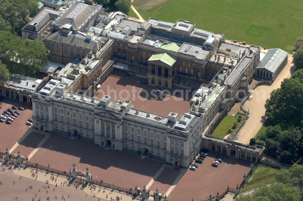 Aerial photograph London - Buckingham Palace is the official residence of the British monarch in London. The palace in the city borough of City of Westminster is in addition to its function as a residence of Queen Elizabeth II and Prince Philip also official state occasions