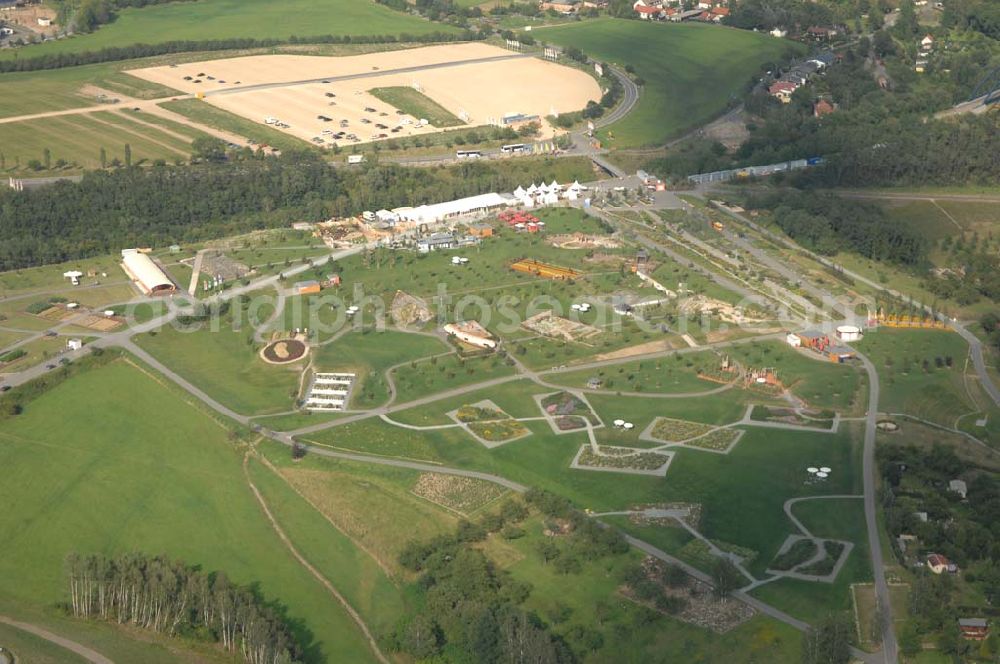 Aerial photograph Ronneburg - . Das 124 Hektar große Areal liegt am Rande des ehemaligen Uranerz-Abbaugebietes der Wismut. Am 27. April 2007 wurde in Ronneburg und in Gera die erste Bundesgartenschau eröffnet, die an zwei Standorten zugleich stattfindet. Sie wird noch bis zum 14. Oktober 2007 andauern.