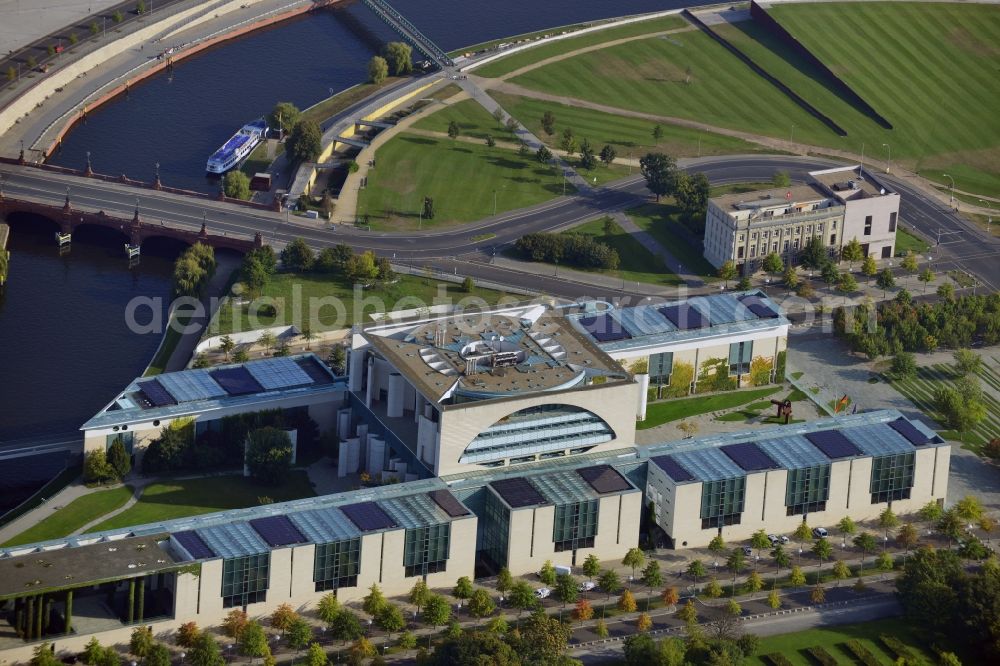 Aerial image Berlin - View at the Federal Chancellery in the so-called government quarter in the district Mitte in Berlin. The Chancellor's Office is a supreme federal authority which supports the German Chancellor in his duties