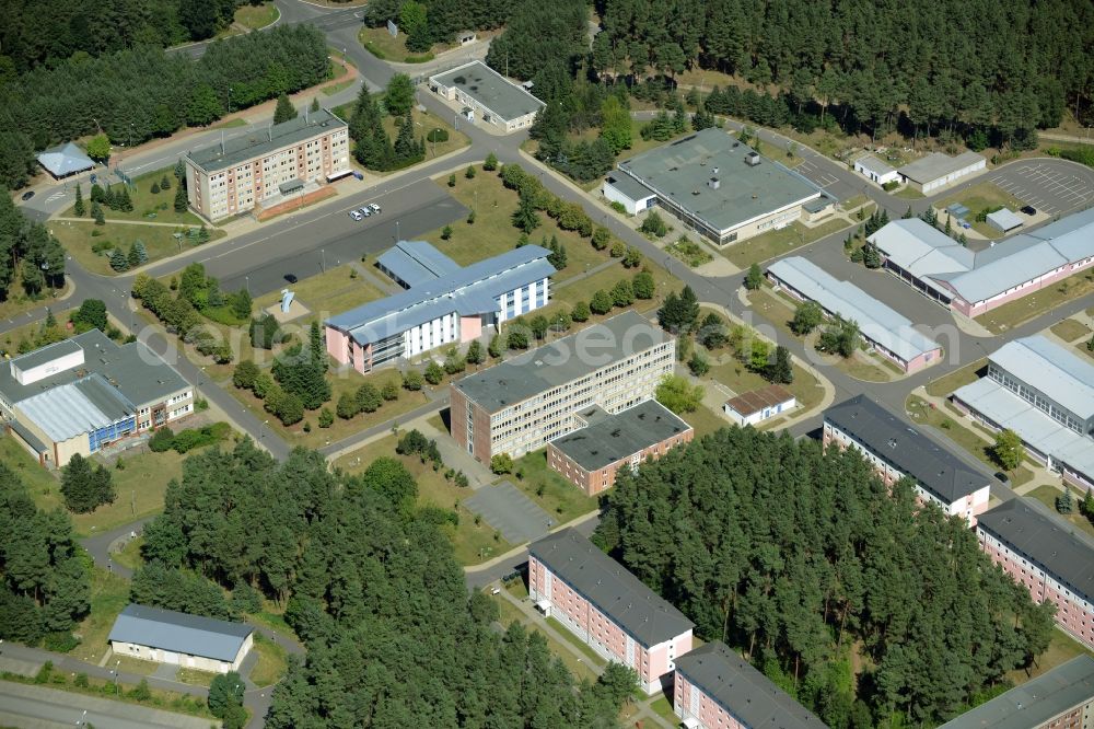 Aerial photograph Neustrelitz - Federal Police Training centre in Neustrelitz in the state of Mecklenburg - Western Pomerania. The compound with its educational facilities and different buildings is located in a forest in the Southwest of the town in the county district of Mecklenburgische Seenplatte