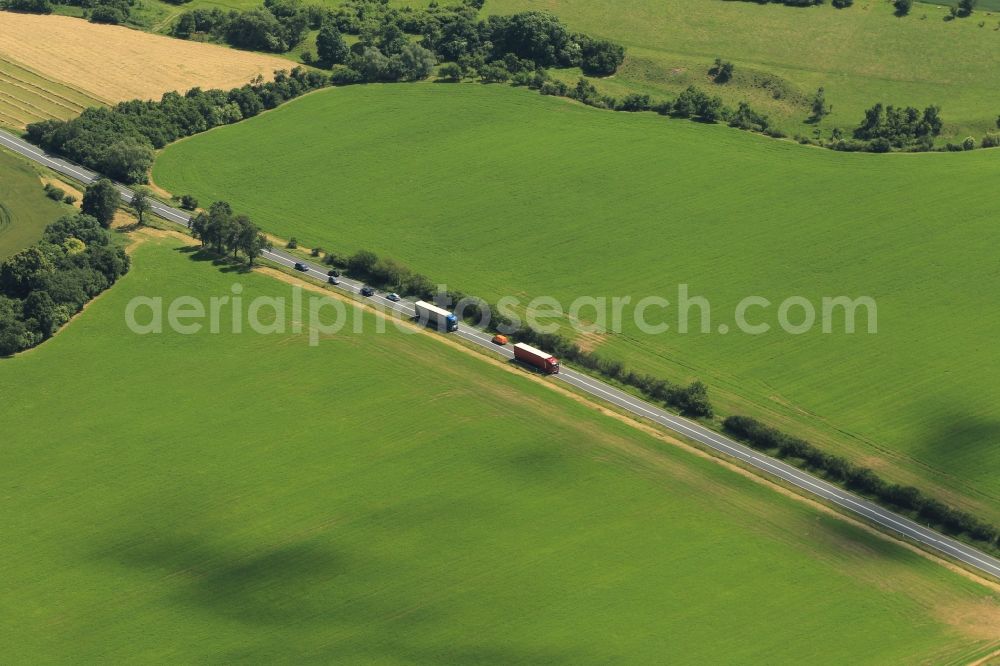 Großenehrich from above - On the federal road B4 in Großenehrich in Thuringia trucks and passenger cars are on the road