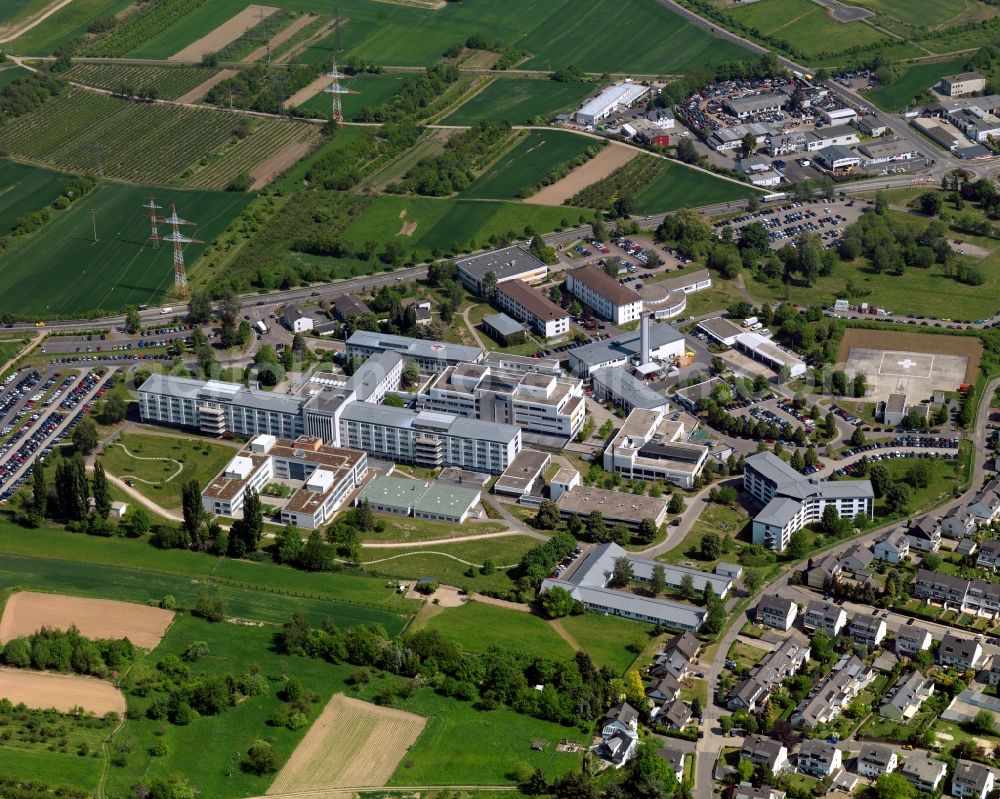 Koblenz from above - Central army hospital in the Metternich part of Koblenz in the state Rhineland-Palatinate. Metternich is located on the left riverbank of the river Moselle. It includes a the campus of the University of Koblenz-Landau, the central military hospital and a nature park. The hospital compound with the helicopter landing pad is located in the Northwest of Metternich