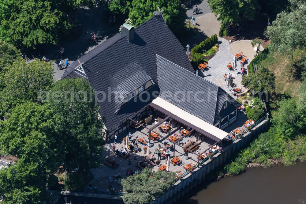 Bremen from above - Plots of Bungalowsiedlung am Kuhgraben with shore area and jetty in Bremen, Germany