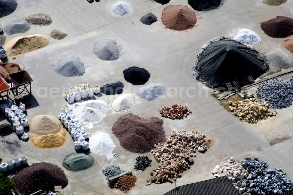 Graben-Neudorf from the bird's eye view: Coloured Gravel and Sands at Gartenkies, Badische Terrazzo Handels- gesellschaft mbH in Graben-Neudorf in the state Baden-Wuerttemberg