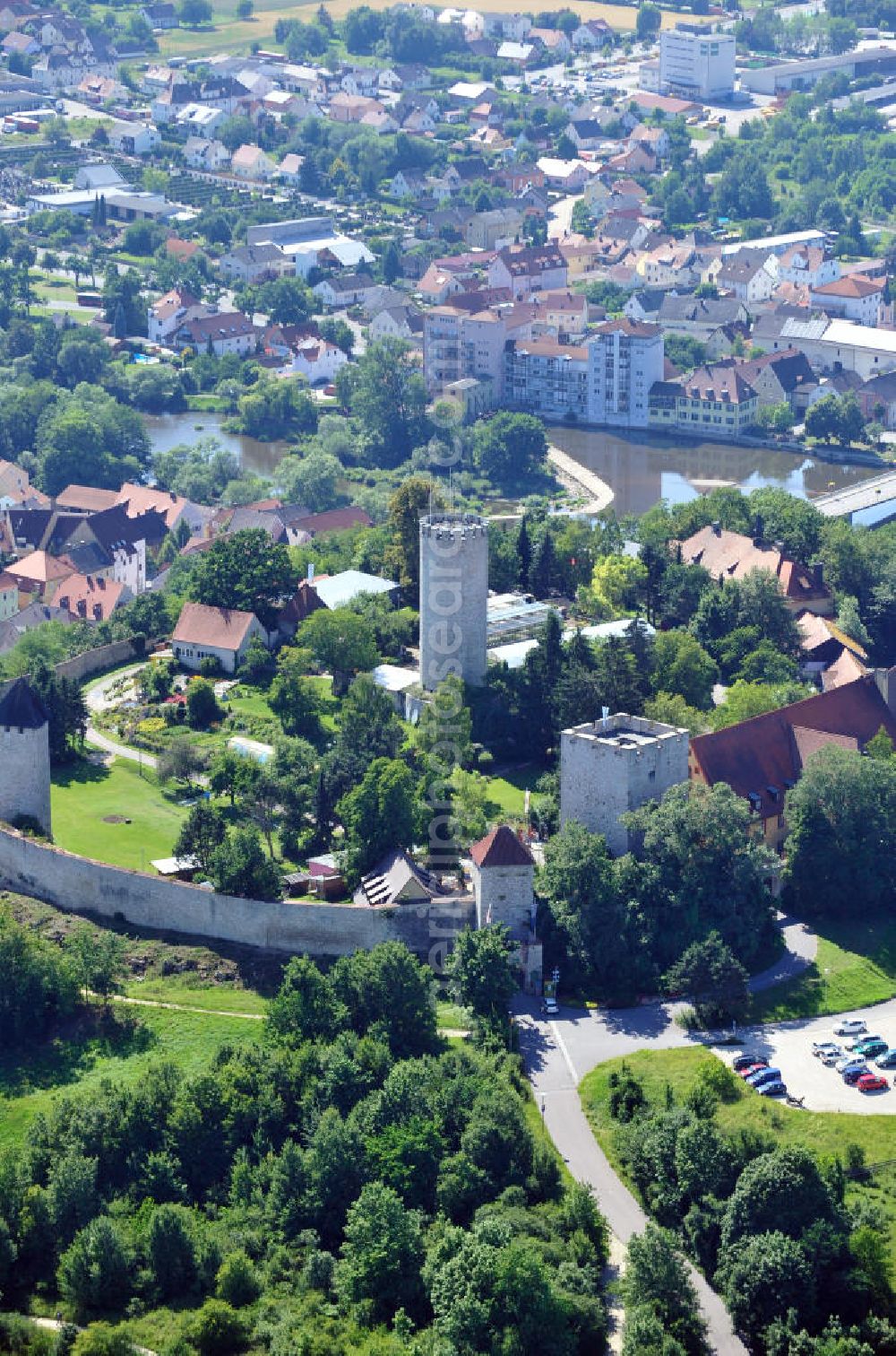 Aerial photograph Burglengenfeld - Die Burg Burglengenfeld oder Burg Lengenfeld an der Naab in der gleichnamigen Stadt Burglengenfeld, Bayern. Sie ist eine der größten in ganz Bayern. Im dritten Reich diente sie der Hitlerjugend als Jugendheim, später dann wurde die Anlage vom Sozialwerk Heuser erworben und ist heute ein heilpädagogisches Zentrum. Castle Burglengenfeld or castle Lengenfeld at the river Naab in the city Burglengenfeld, Bavaria. It is one of the biggest castlews in Bavaria. In the third Reich it served as a youth center of the Hitler Youth, later then the Sozialwerk Heuser acquired the castle ground and established a curative education center there.