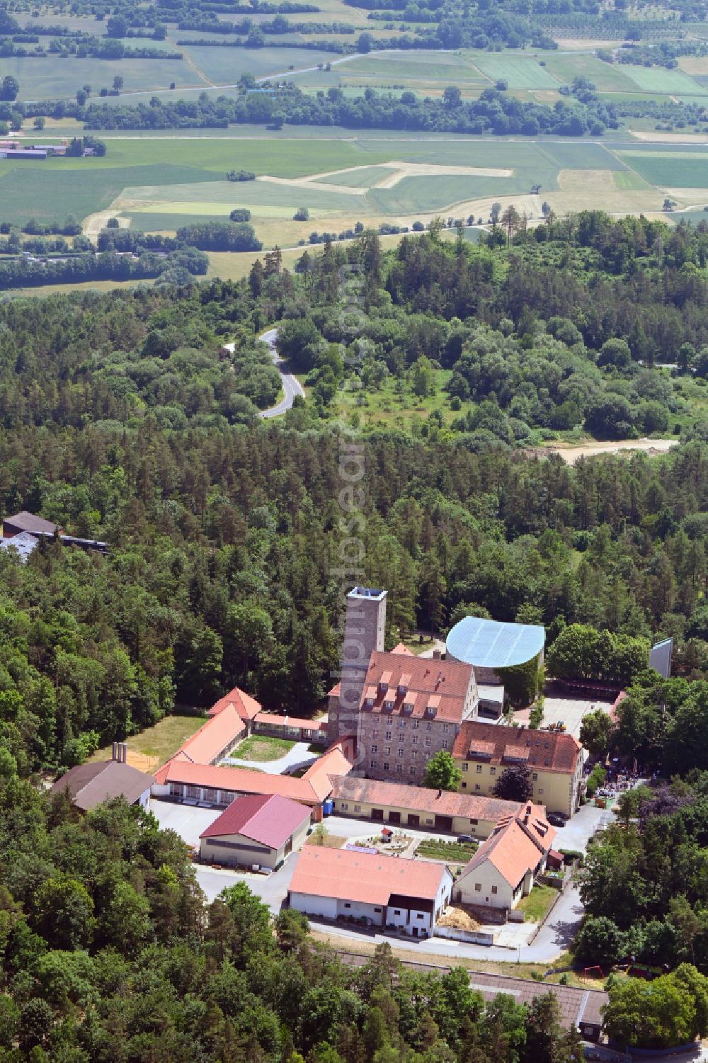 Ebermannstadt from above - Castle of the fortress Feuerstein with the youth center Jugendhaus Burg Feuerstein in the district Niedermirsberg in Ebermannstadt in the state Bavaria, Germany