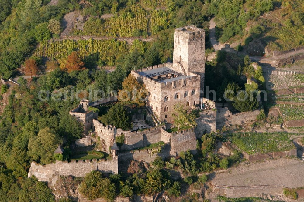 Aerial photograph Kaub - Castle Gutenfels on cultivation fields on a mountain at the riverside of the Rhine in Kaub in Rhineland-Palatinate. The castle is part of the UNESCO World Heritage List