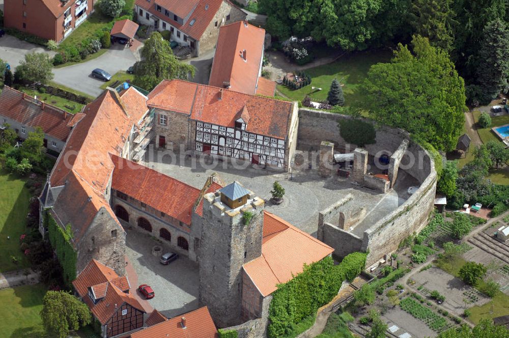 Aerial photograph Oebisfelde - Weferlingen - Blick auf die Burg Oebisfelde in Oebisfelde-Weferlingen in Sachsen-Anhalt. Die Burg Oebisfelde, auch Sumpfburg Oebisfelde genannt, ist eine der ältesten noch erhaltenen Sumpfburgen in Europa und stammt aus dem 10. Jahrhundert. View of the Castle in Oebisfelde in Oebisfelde-Weferlingen, Saxony-Anhalt. The castle Oebisfelde is one of the oldest surviving swamp castles in Europe, dating from the 10th Century.