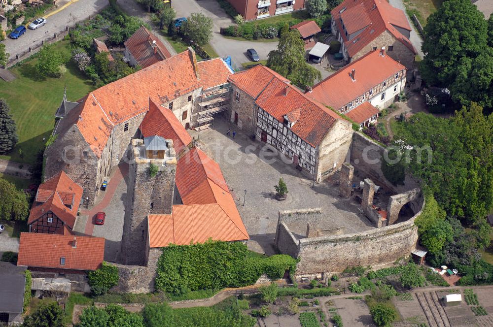 Oebisfelde - Weferlingen from the bird's eye view: Blick auf die Burg Oebisfelde in Oebisfelde-Weferlingen in Sachsen-Anhalt. Die Burg Oebisfelde, auch Sumpfburg Oebisfelde genannt, ist eine der ältesten noch erhaltenen Sumpfburgen in Europa und stammt aus dem 10. Jahrhundert. View of the Castle in Oebisfelde in Oebisfelde-Weferlingen, Saxony-Anhalt. The castle Oebisfelde is one of the oldest surviving swamp castles in Europe, dating from the 10th Century.