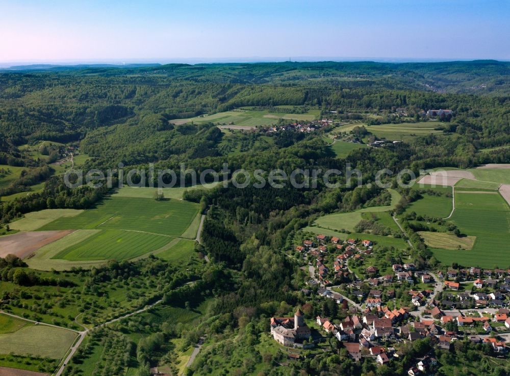 Oppenweiler from the bird's eye view: Castle Reichenberg in Oppenweiler in the state of Baden-Wuerttemberg. The high fortress from the 13th century is located on a hill above Oppenweiler. View over the castle towards the North. The compound with its round tower, ring wall with half-timber and gabled roof is used as a care home