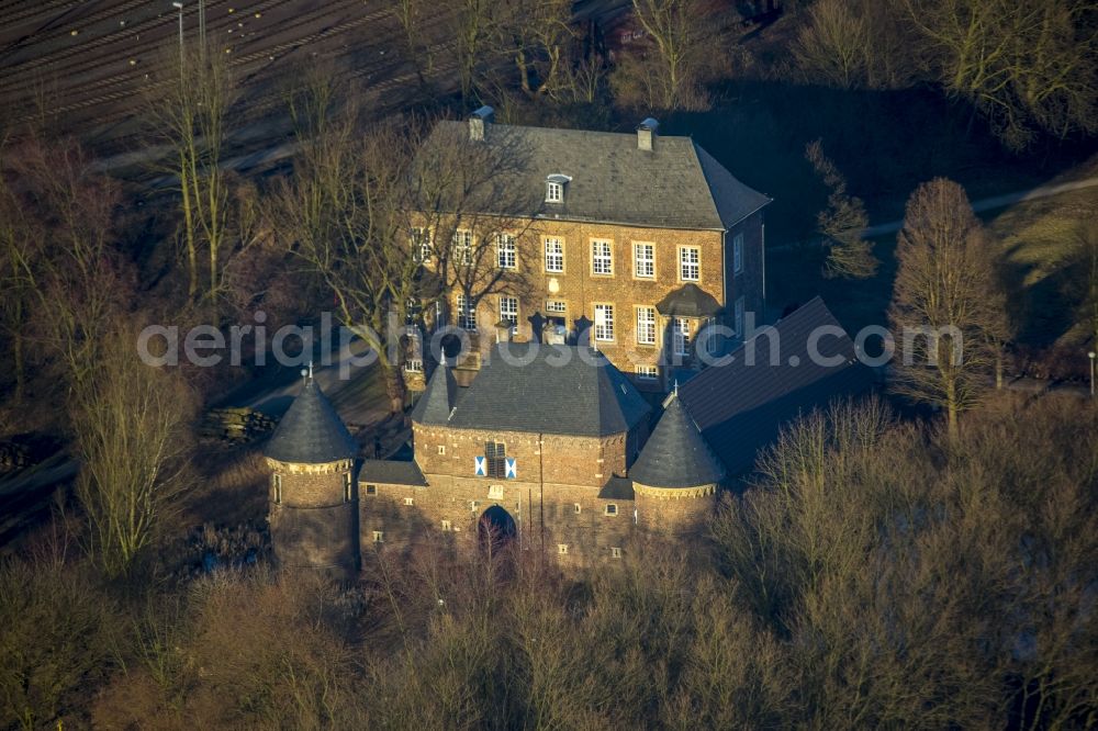 Aerial image Oberhausen - Castle Vondern in late winter light in Oberhausen in North Rhine-Westphalia. Vondern Castle is a two part system consisting of a manor house and a two-winged outer bailey