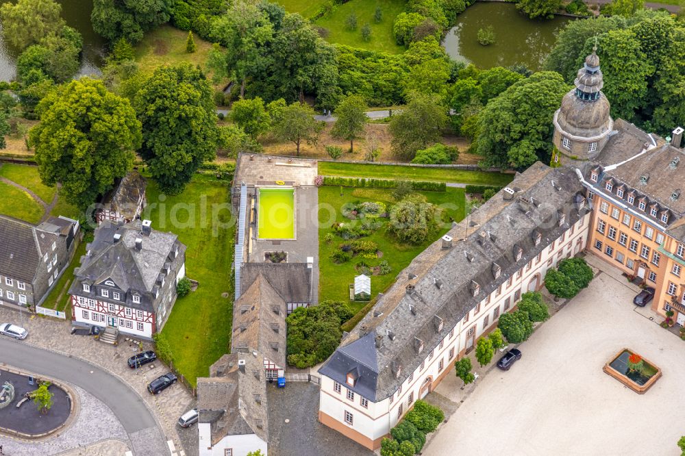 Bad Berleburg from above - Castle complex on the plateau Schloss Berleburg on place Goetheplatz in Bad Berleburg at Siegerland in the state North Rhine-Westphalia, Germany