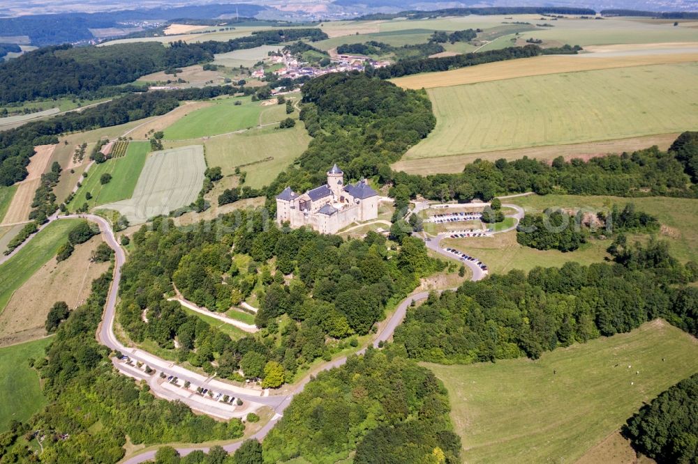 Manderen from the bird's eye view: Castle of Schloss Malbrouck in Manderen in Grand Est, France