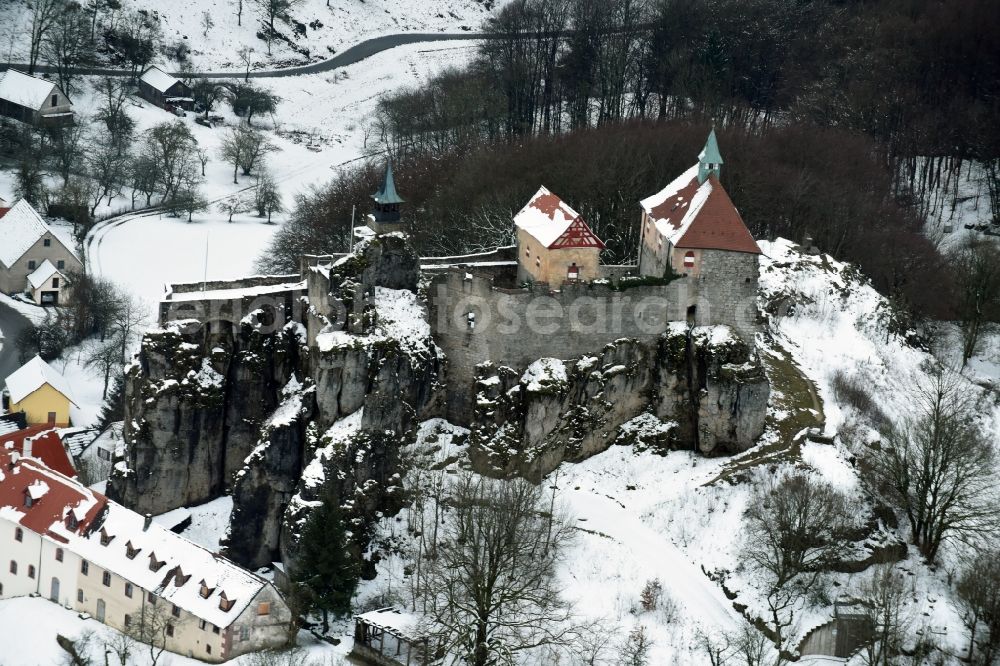 Kirchensittenbach from the bird's eye view: Wintry snowy Castle of the fortress Felsburg om Hohenstein in Kirchensittenbach in the state Bavaria