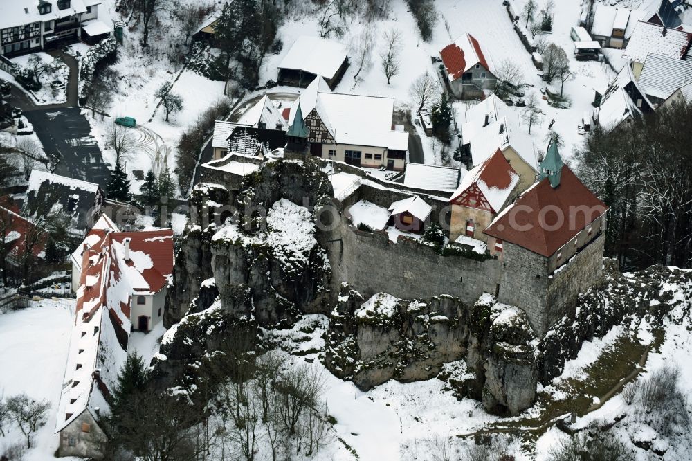 Aerial image Kirchensittenbach - Wintry snowy Castle of the fortress Felsburg om Hohenstein in Kirchensittenbach in the state Bavaria