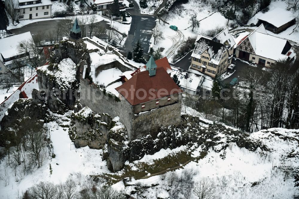 Aerial photograph Kirchensittenbach - Wintry snowy Castle of the fortress Felsburg om Hohenstein in Kirchensittenbach in the state Bavaria