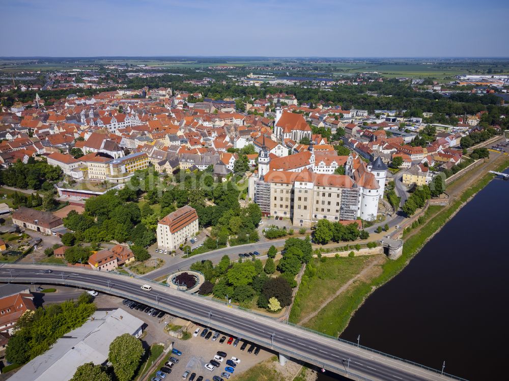 Torgau from above - Castle of the fortress Schloss und Schlosskirche Hartenfels in Torgau in the state Saxony