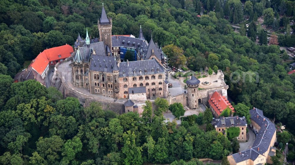 Wernigerode from the bird's eye view: Castle of the fortress Schloss Wernigerode in Wernigerode in the state Saxony-Anhalt, Germany