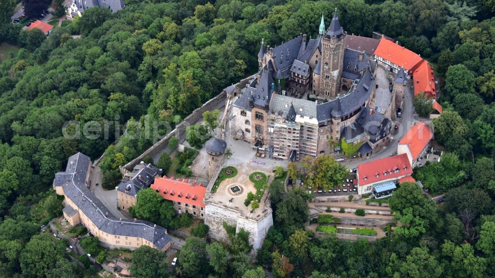 Wernigerode from the bird's eye view: Castle of the fortress Schloss Wernigerode in Wernigerode in the state Saxony-Anhalt, Germany