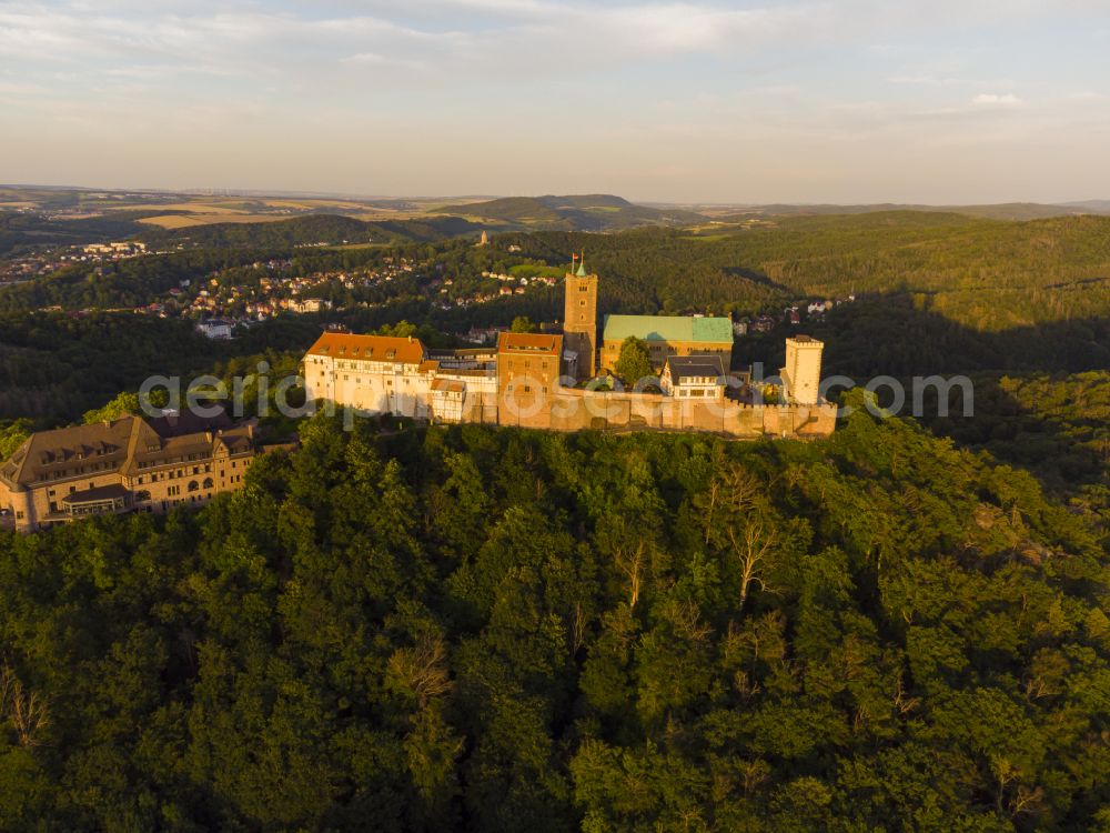 Eisenach from the bird's eye view: Night lights and lighting at the Wartburg Fortress in Eisenach in the state of Thuringia, Germany