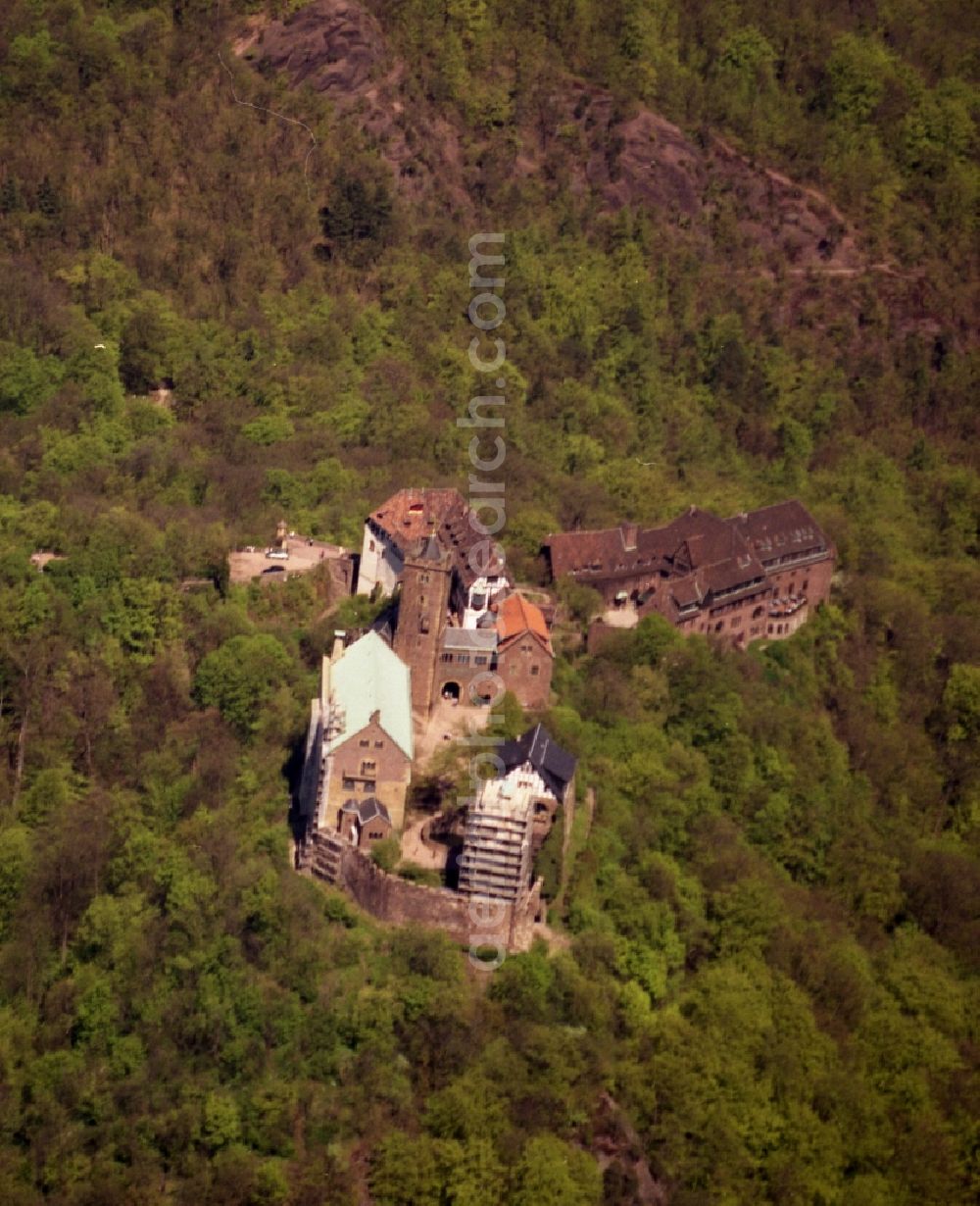 Aerial image Eisenach - View of the Wartburg-Stiftung Eisenach near Eisenach in Thuringia. The castle dates from the 11th Century, but has its present form since the mid-19th Century. Since 1999 it is a UNESCO World Heritage Site