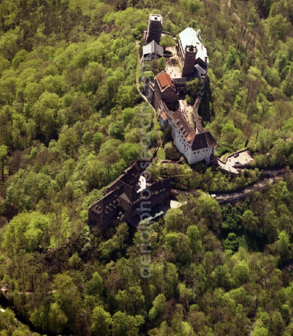 Aerial photograph Eisenach - View of the Wartburg-Stiftung Eisenach near Eisenach in Thuringia. The castle dates from the 11th Century, but has its present form since the mid-19th Century. Since 1999 it is a UNESCO World Heritage Site