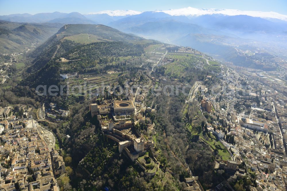 Aerial image Granada - Walls of the castle complex on the plateau Alhambra in the district Centro in Granada in Andalucia, Spain