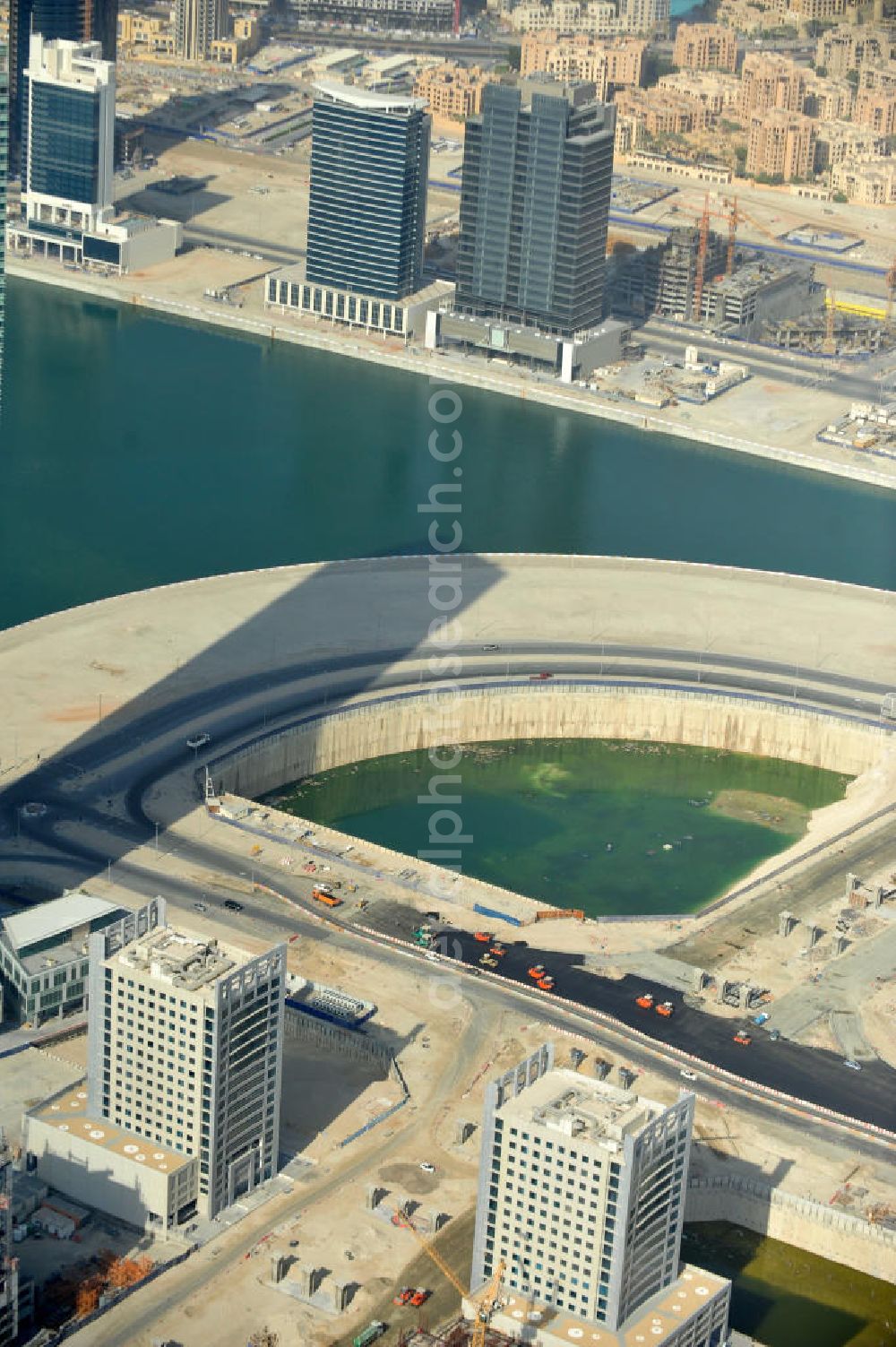 Aerial image Dubai - Blick auf die Büro- und Geschäftshäuser der Business Bay, einem Stadtentwicklungsvorhaben in Dubai. Die Gegend soll als zentrales Geschäftszentrum dienen. Der Business Bay Creek ist eine künstliche Verlängerung des Dubai Creek. View over the office and commercial buildings of Business Bay, an urban development project of Dubai. The area is meant to become Dubai's central business district. The Business Bay Creek is an artificial extension of Dubai Creek.