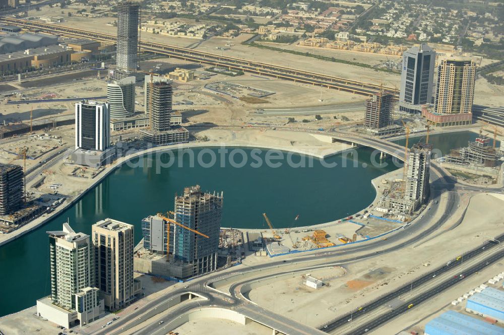 Aerial image Dubai - Blick auf die Büro- und Geschäftshäuser der Business Bay, einem Stadtentwicklungsvorhaben in Dubai. Die Gegend soll als zentrales Geschäftszentrum dienen. Der Business Bay Creek ist eine künstliche Verlängerung des Dubai Creek. View over the office and commercial buildings of Business Bay, an urban development project of Dubai. The area is meant to become Dubai's central business district. The Business Bay Creek is an artificial extension of Dubai Creek.