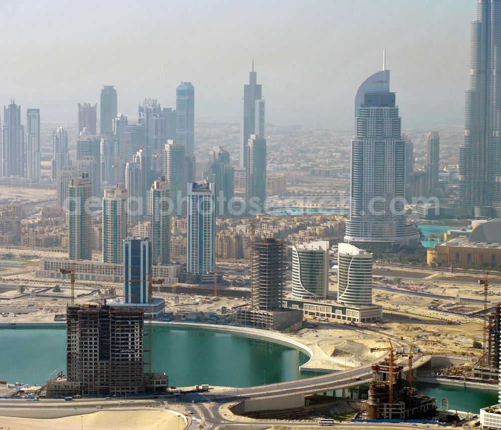 Aerial image Dubai - Blick auf die Büro- und Geschäftshäuser der Business Bay, einem Stadtentwicklungsvorhaben in Dubai. Die Gegend soll als zentrales Geschäftszentrum dienen. Der Business Bay Creek ist eine künstliche Verlängerung des Dubai Creek. View over the office and commercial buildings of Business Bay, an urban development project of Dubai. The area is meant to become Dubai's central business district. The Business Bay Creek is an artificial extension of Dubai Creek.