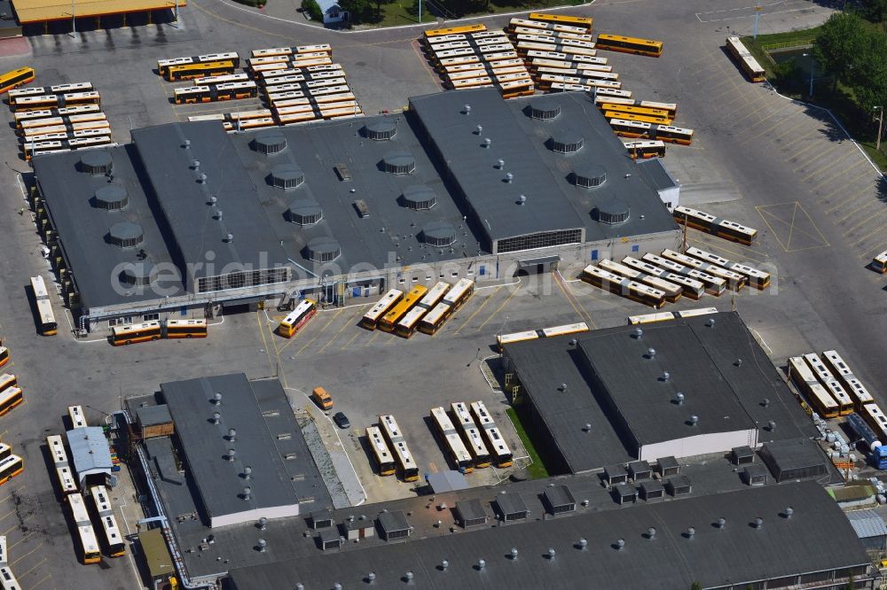 Aerial image Warschau - Busses at the bus garage in the Mokotow District in Warsaw in Poland. The garage with its workshops, halls and parking lots is located on Jana Pawla Woronicza street. Several busses of the public transportation are parked here