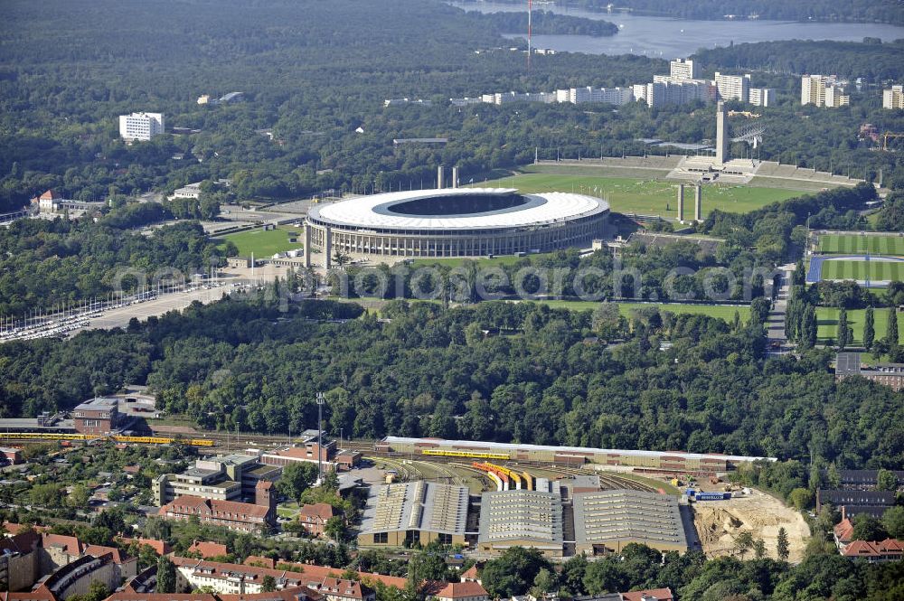 Berlin from above - Blick auf die BVG-Betriebswerkstatt Grunewald (vorn) am Berliner Olympiastadion. View of the BVG operation workshop Grunewald (front) at the Berlin Olympic Stadium.